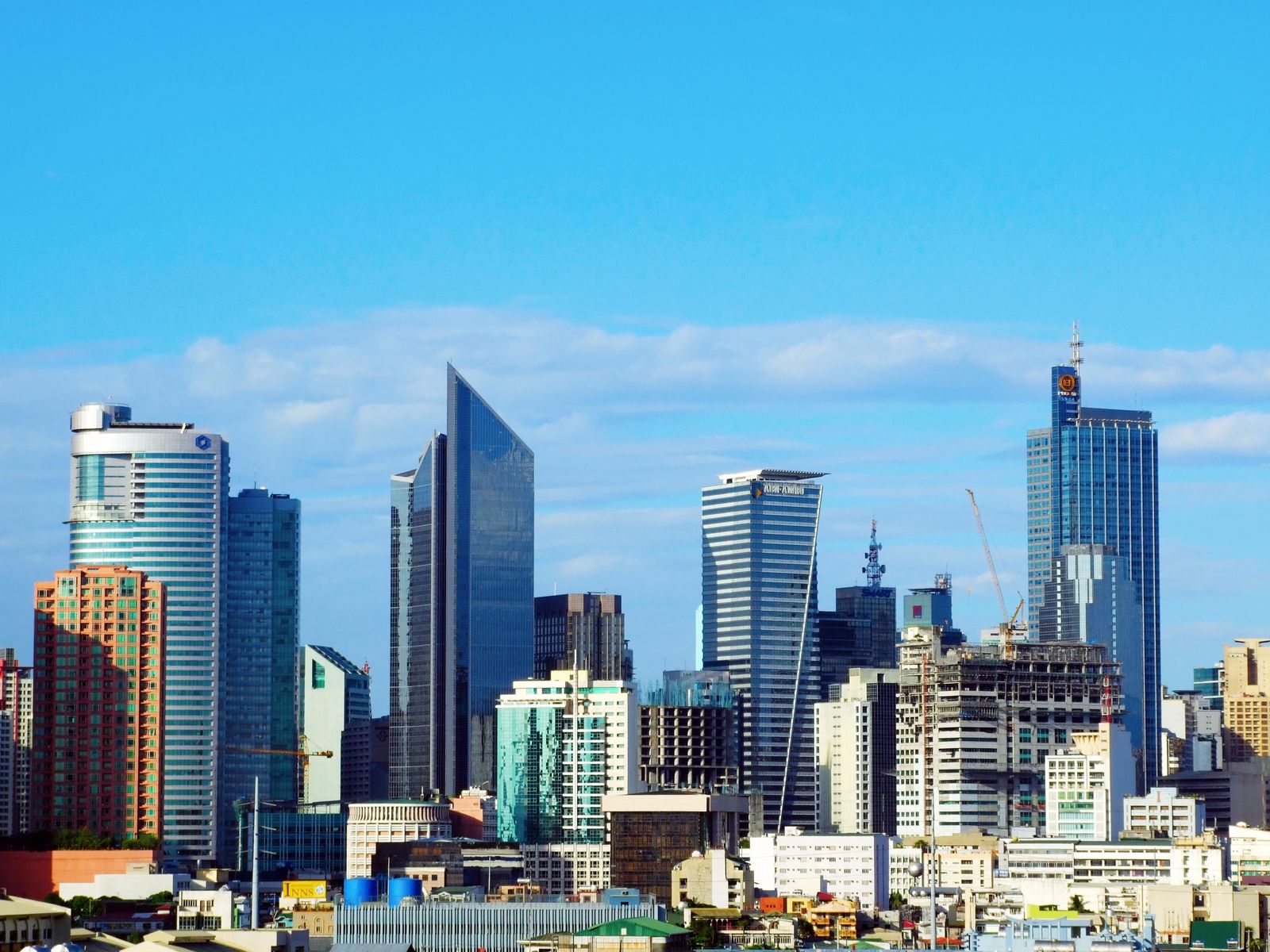 Makati CBD skyline with GT Tower — condos and offices for rent or sale along Ayala